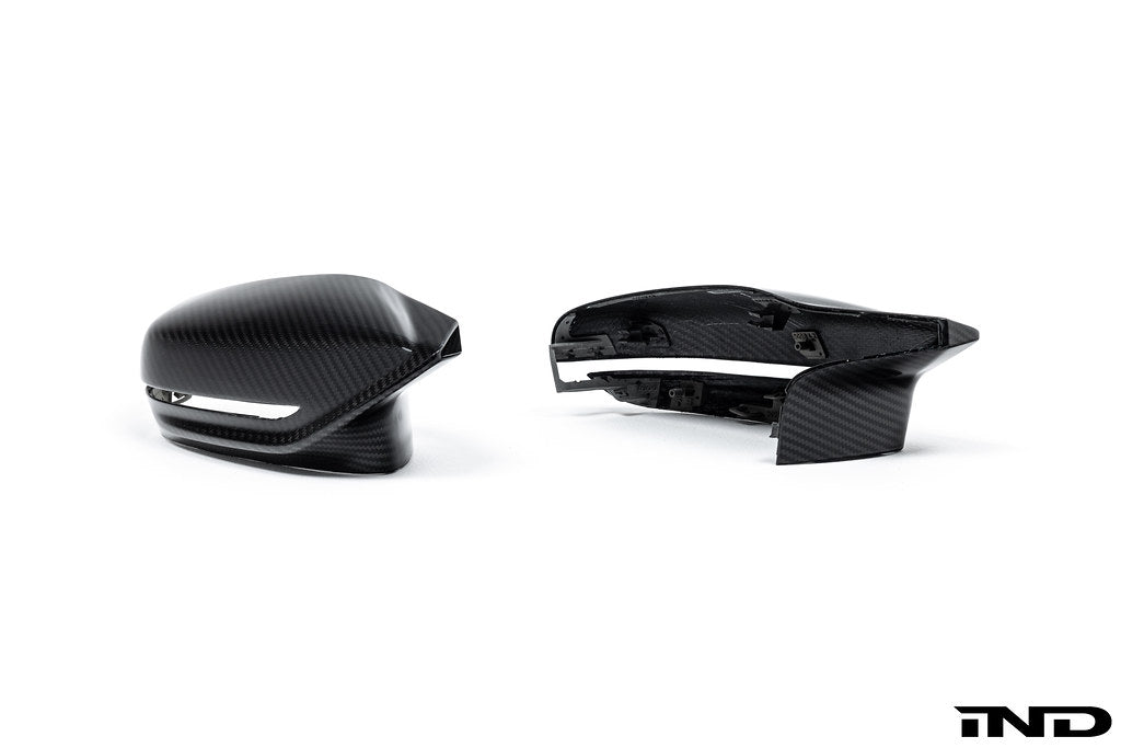 Alpha N G8X M2 M3 M4 carbon mirror cap set on white background, showcasing sleek exterior vehicle mirror covers.