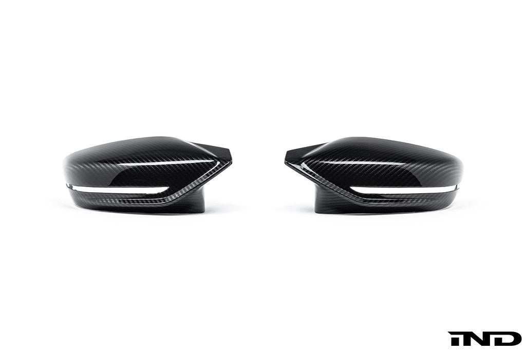 Alpha N G8X M2 M3 M4 carbon mirror cap set shown against a white background, exterior car accessory for BMW models.