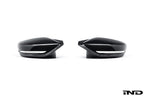 Alpha N G8X M2 M3 M4 carbon mirror cap set shown against a white background, exterior car accessory for BMW models.