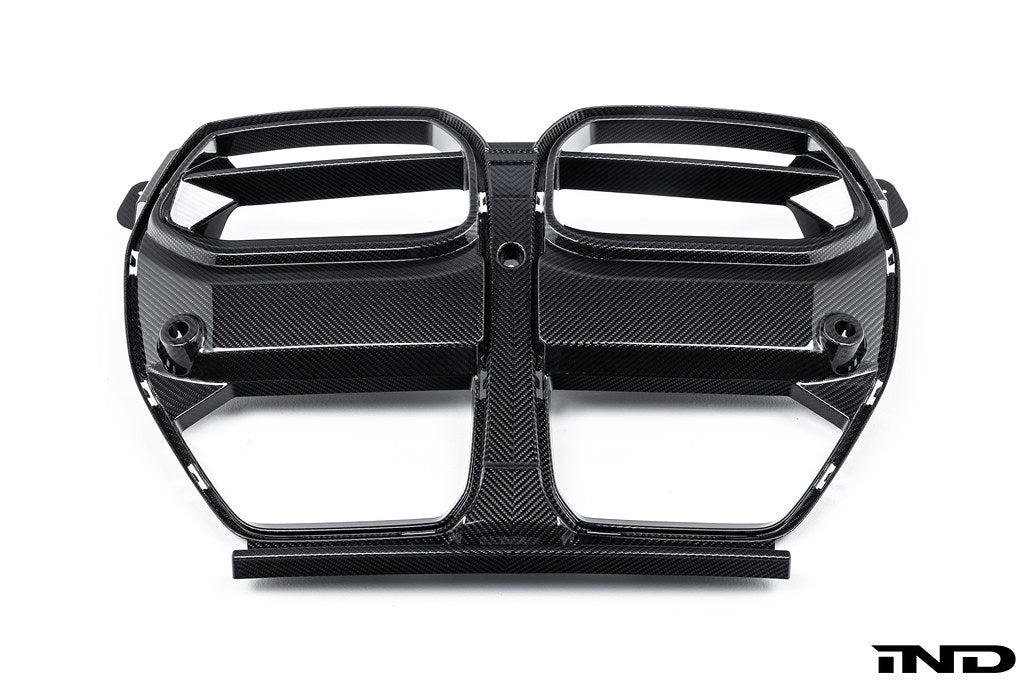 Alpha N G8X M3 M4 carbon front grille for BMW, shown on white background, exterior automotive part with sleek carbon finish.