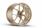 BBS FI-R G90 G99 M5 21-inch forged wheels in white and gold finish, displayed on a white background.