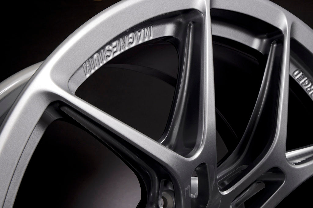 Set of BBS G8X MAG-R 20-inch wheels for M2, M3, and M4 models, featuring a sleek white finish on a neutral background.