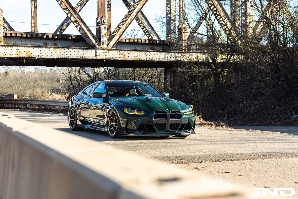 BBS G8X M2/M3/M4 RI-D 20-inch diamond gold wheel set on a vehicle, showcasing sleek alloy wheels with detailed design.