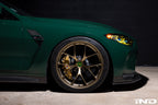 BBS G8X M2 M3 M4 RI-D 20-inch diamond gold wheel set installed on a vehicle, showcasing sleek, multi-spoke alloy wheels.