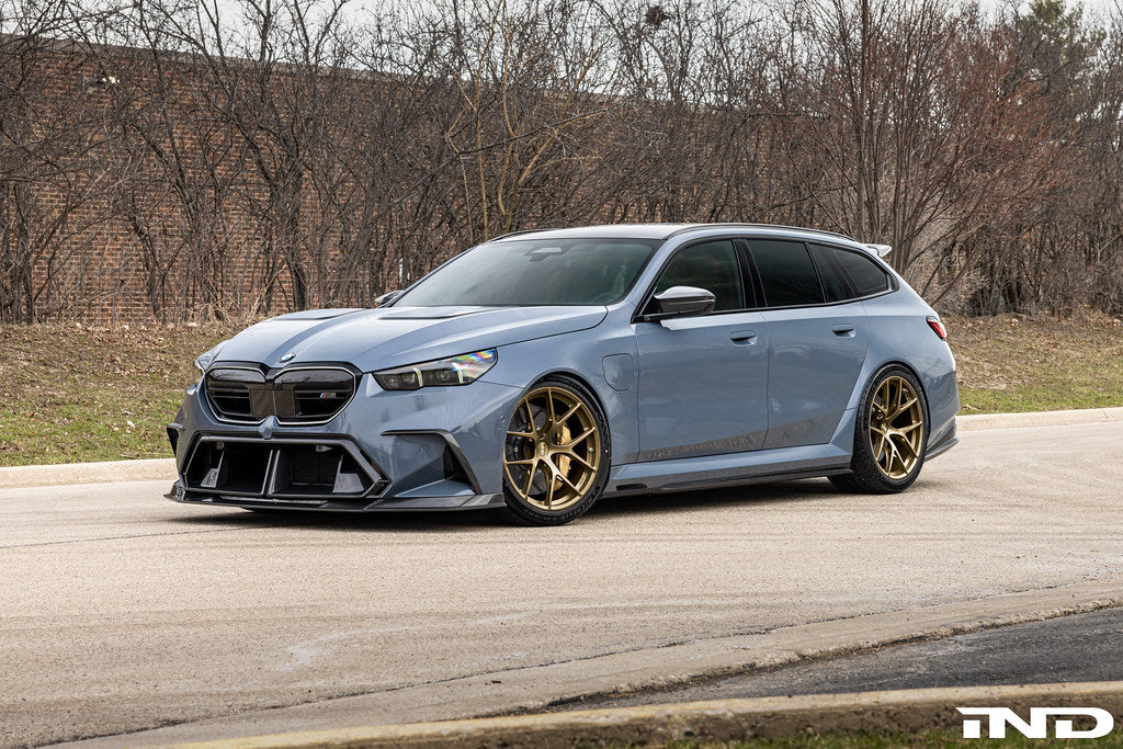 BBS G90 G99 M5 FI-R 21-inch wheel set installed on a vehicle, showcasing sleek alloy wheels with a modern design.