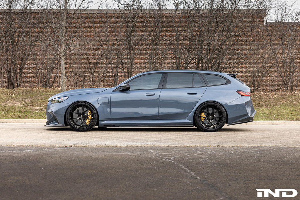 BBS G90 G99 M5 FI-R 21-inch alloy wheel set installed on a vehicle, showcasing a sleek, multi-spoke wheel design.
