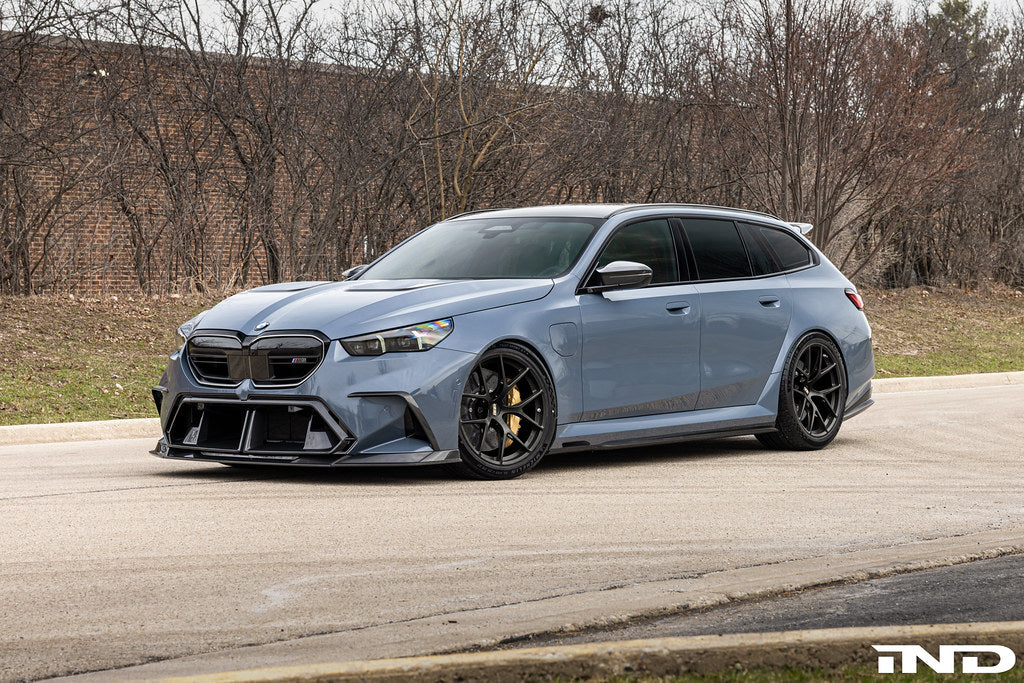BBS G90 G99 M5 FI-R 21-inch alloy wheel set installed on a vehicle, showcasing sleek, sporty wheel design and finish.