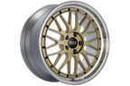 BBS LM Porsche 911 Carrera (992) 20" / 21" wheel set with diamond gold finish, showing close-up of alloy wheels.