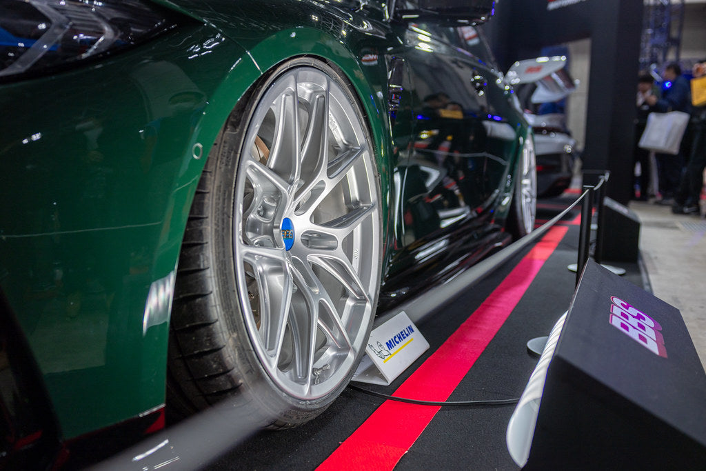 Silver BBS G8X Mag-R 20-inch forged magnesium wheels installed on a BMW G80 M3, showcasing the sleek design and alloy finish.