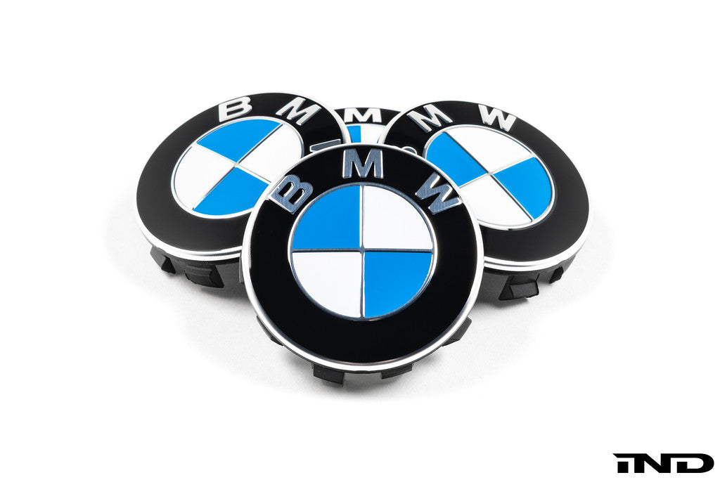 BMW 56mm OEM wheel center cap set on white background