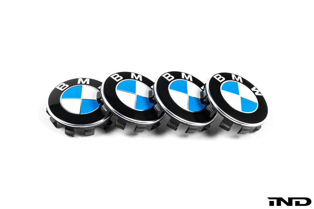 BMW 56mm OEM wheel center cap set on white background