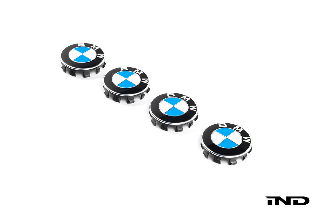 BMW 56mm OEM wheel center cap set on white background