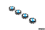 BMW 56mm OEM wheel center cap set on white background