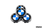 BMW 56mm wheel center caps Next Dark design genuine BMW center caps on white background