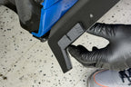 Megachip F90 M5 splash guard set installed on a blue BMW F90 M5, showing exterior protection and fitting details.