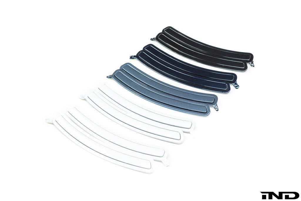 IND Painted Front Reflector Set for the BMW G05 X5 and F95 X5M on a white background, painted in-house using factory BMW paint codes.