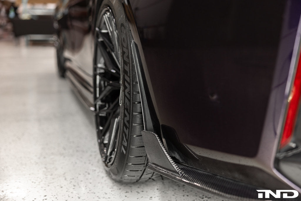 BMW G20 M340i with Megachip G20 3-Series splash guards installed on exterior of vehicle.