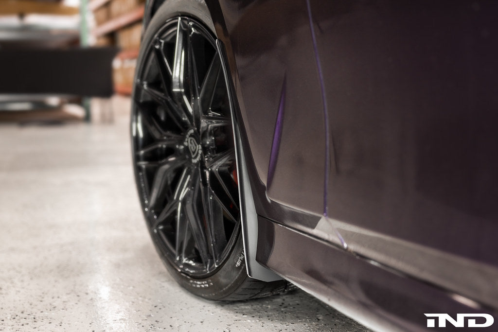 BMW G20 M340i with Megachip G20 3-Series Splash Guards installed on exterior, showing the protective guards on wheel arches.