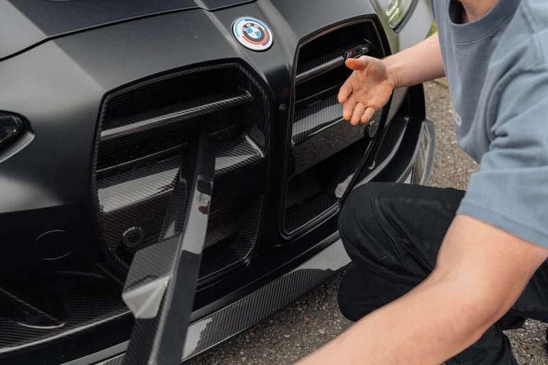 TREVORA G8X M3 M4 pre-preg carbon fiber foam crash bar cover on BMW G80 G82 M3 M4 exterior.