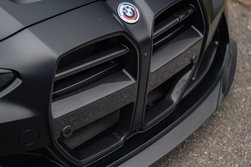 TREVORA G8X M3 M4 carbon fiber foam crash bar cover for BMW G80 G82 G83 exterior upgrade, showcasing sleek carbon fiber finish.