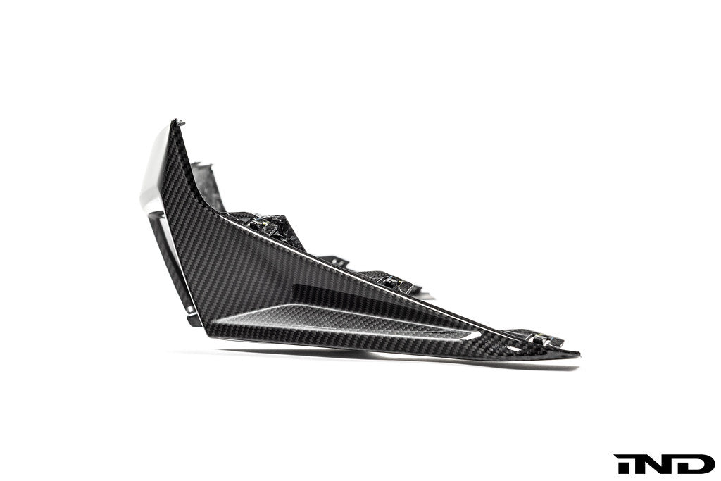 BMW G87 M2 CS carbon rear diffuser for exterior, showcasing its aerodynamic design and carbon fiber finish.