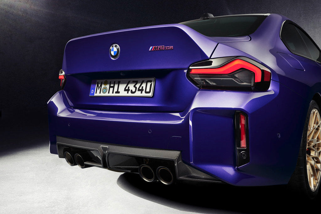 BMW G87 M2 CS carbon rear diffuser installed, showcasing the sleek, aerodynamic exterior component for enhanced vehicle performance.