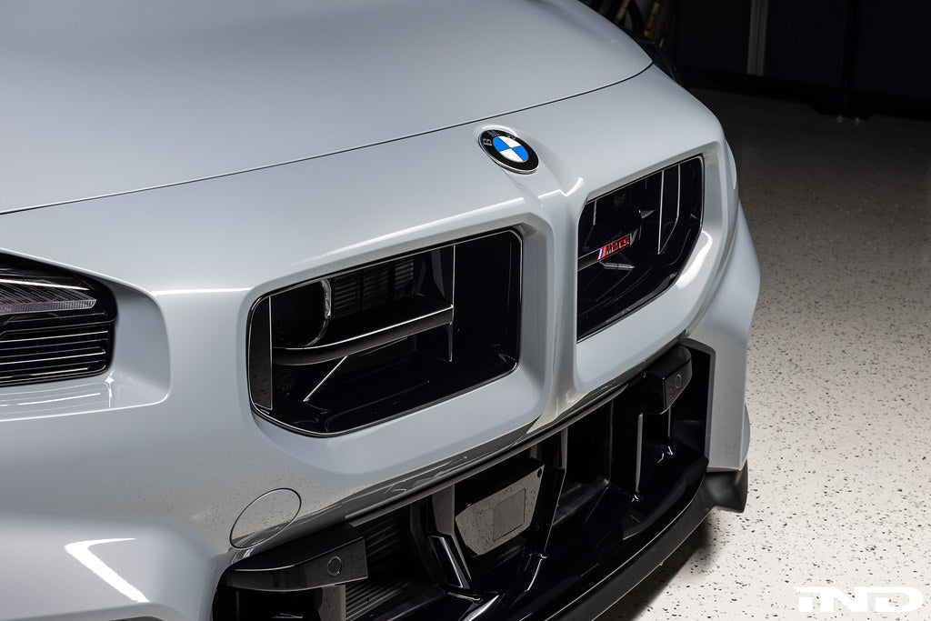 BMW G87 M2 CS front grille installed, showcasing the sleek exterior design and sporty grille details of the BMW M2 CS.