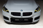 BMW G87 M2 CS exterior front splitter attached to the grille, showcasing a sleek aerodynamic design.