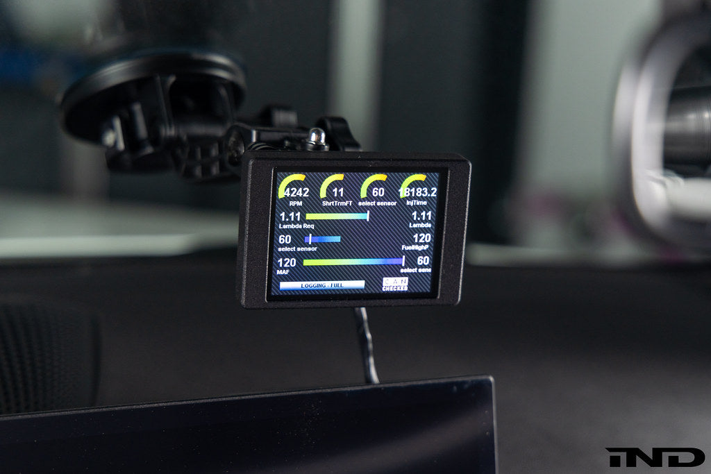 CANchecked MFD32 3.2-inch Gen2 multi-function display installed inside a BMW G87 M2 interior.