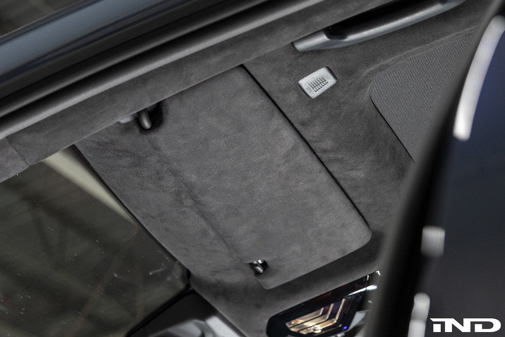 Installed BMW G90 G99 M5 Alcantara European sun visor set in vehicle interior