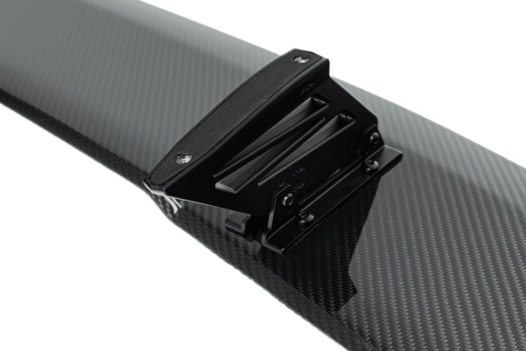 TREVORA TR87 V2 carbon rear wing mounted on BMW M2 F87, M3 G80, or M4 G82 with flat trunk exterior design.