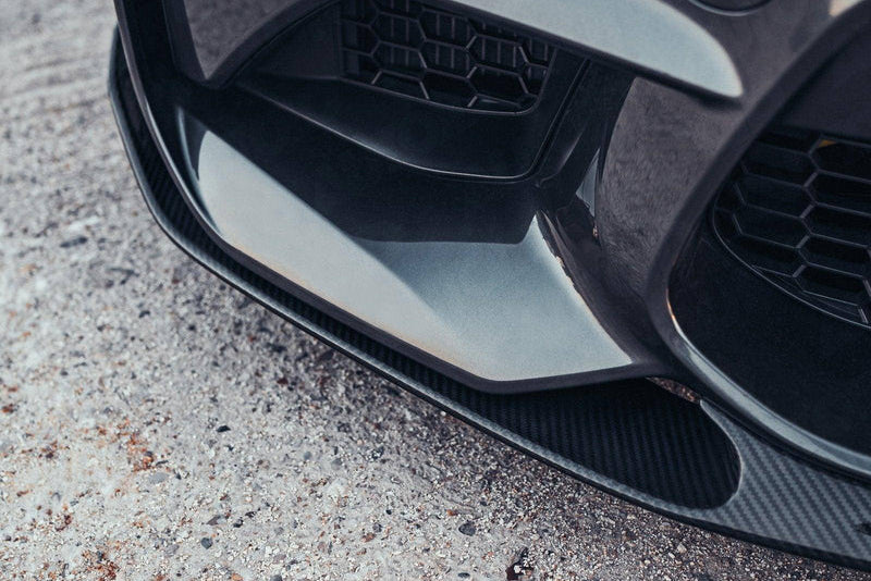 BMW M2 F87 TREVORA OG Pre-Preg Carbon Front Splitter, exterior automotive part with carbon fiber finish for enhanced aerodynamics.