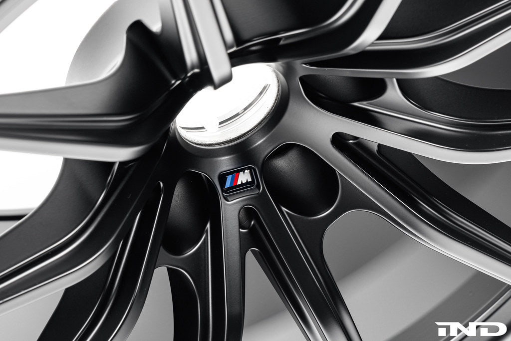 BMW Motorsport G87 M2 racing wheels, 18x10-inch black alloy wheels on white background