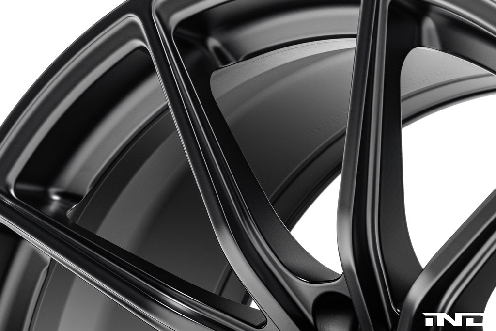 BMW Motorsport G87 M2 racing wheels, 18x10 black alloy wheels on white background, showcasing sporty design.