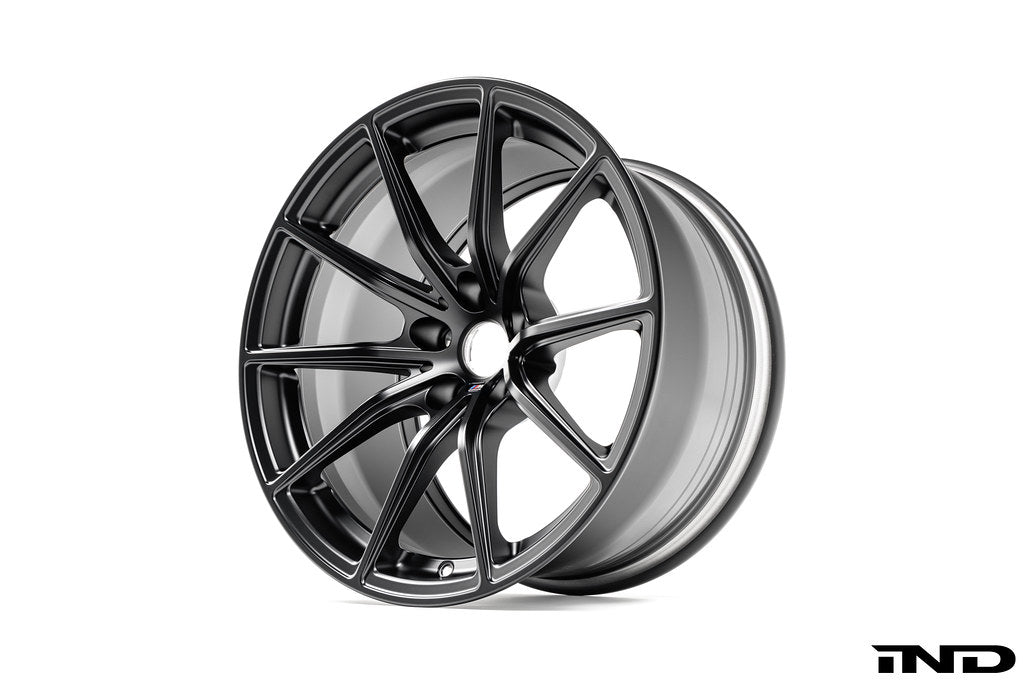 BMW Motorsport G87 M2 racing wheels, black 18x10 alloy wheel set with a sleek design, displayed on a white background.