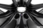 BMW Motorsport G87 M2 racing wheels, 18x10 inches, black finish with a sleek design, displayed on a white background.