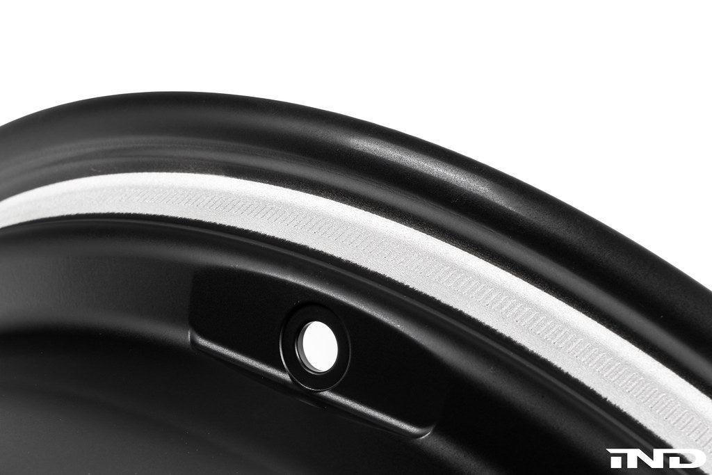 BMW Motorsport G87 M2 racing wheels, 18x10 black alloy wheels with a sleek design, displayed on a white background.