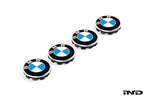 BMW wheel center cap set with 68mm diameter, featuring a white background and showcasing the sleek, modern design.