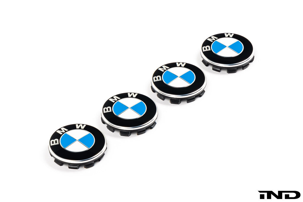 BMW wheel center cap set with 68mm diameter, featuring a white background and showcasing the sleek, modern design.