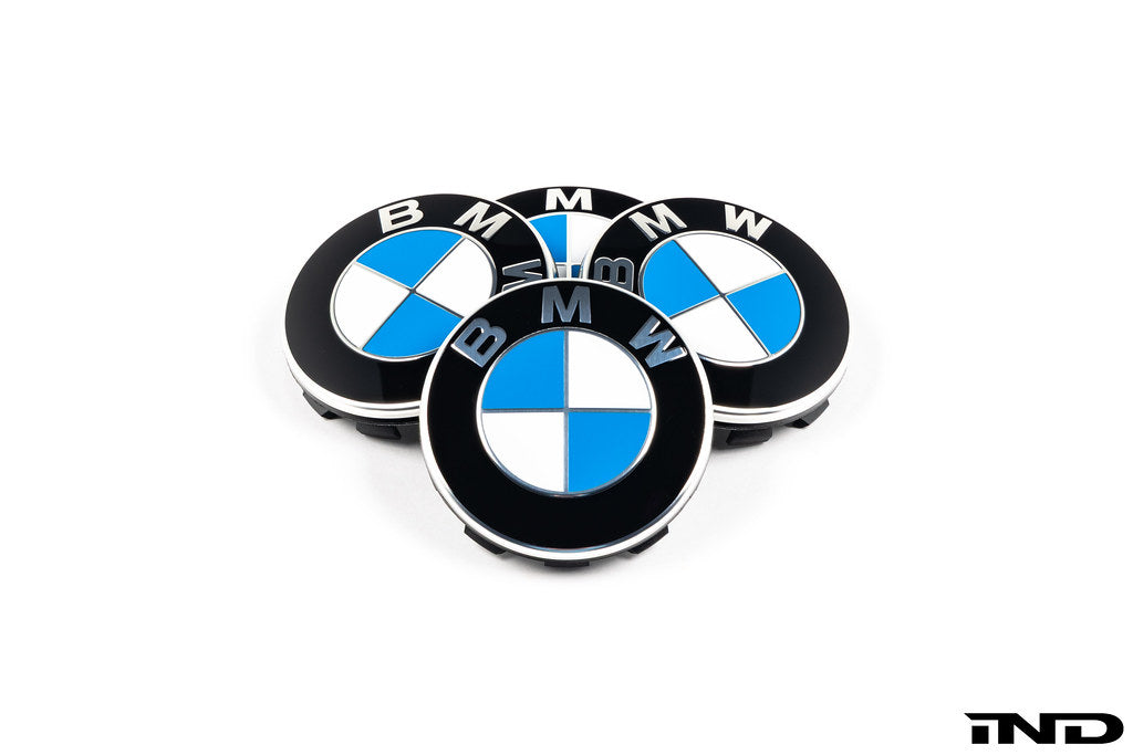 BMW wheel center cap set, 68mm size, featuring white background with close-up view of the wheel center caps.