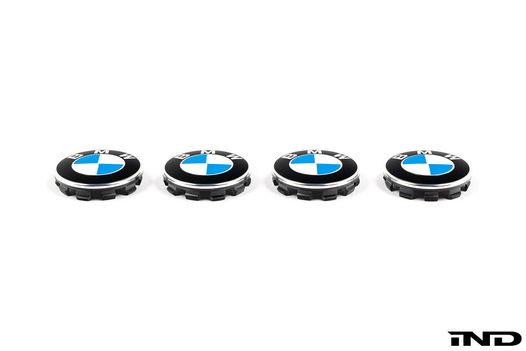 BMW wheel center cap set featuring four 68mm white caps for wheels, with the BMW logo in the center.