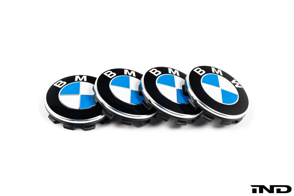 BMW wheel center cap set, 68mm, featuring white background with close-up view of the stylish BMW logo caps for wheels.