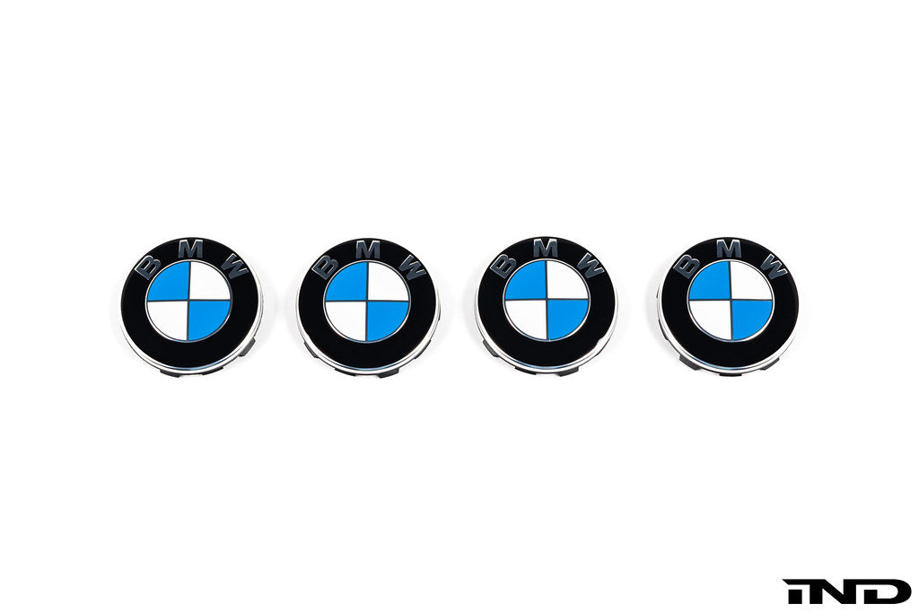 BMW wheel center cap set with 68mm diameter, featuring a white background and the BMW logo on a sleek wheel accessory.