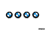 BMW wheel center cap set with 68mm diameter, featuring a white background and the BMW logo on a sleek wheel accessory.
