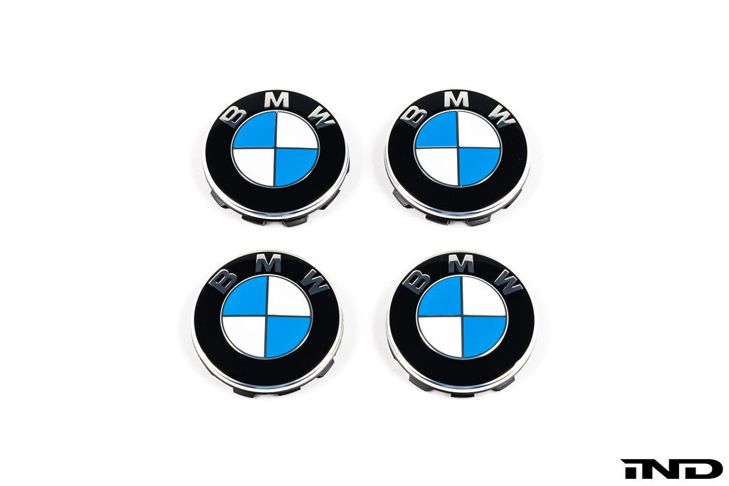 BMW wheel center cap set with 68mm diameter, featuring a white background and showcasing the sleek design of the BMW logo.