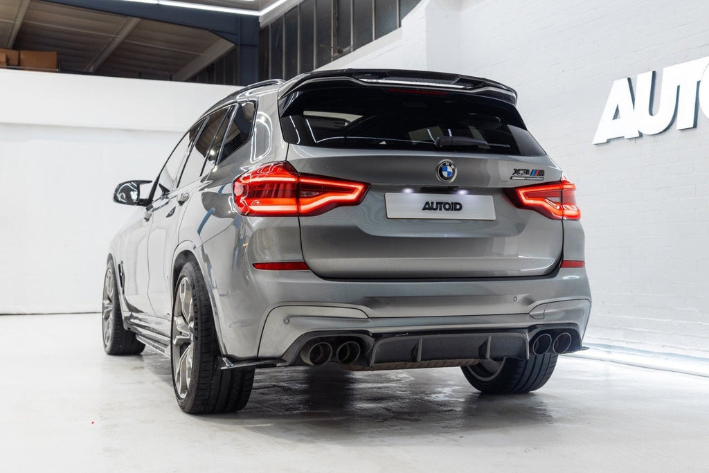 BMW X3M F97 carbon rear roof spoiler by TREVORA, exterior view showing lightweight carbon fiber design on the 2019-2021 model.