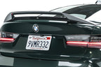 ADRO G80 M3 Carbon Fiber Trunk Spoiler V2 mounted on a BMW G80 M3, showcasing its sleek, lightweight aerodynamic design.