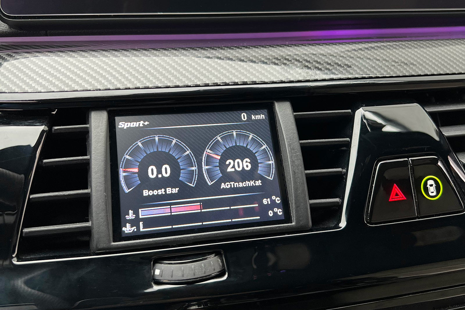 CANchecked F90 M5 G30 5-Series interior multi-function display installed in a BMW, showing digital gauges on a 3.2-inch Gen2 screen.