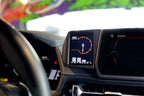 CANchecked A90 MK5 GR Supra 3.2-inch Gen2 multi-function display installed inside the car interior, showing digital readouts and controls.