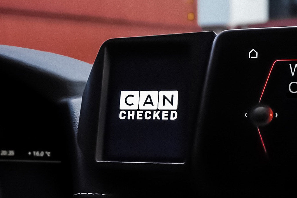Interior view of CANchecked A90 MK5 GR Supra Multi Function Display 3.2" Gen2 installed in a car dashboard.